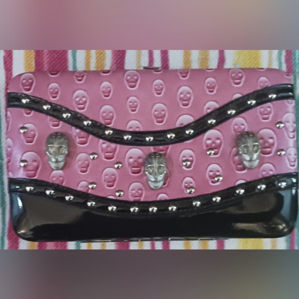 Like new Pink Skull Embossed Women's Clutch purse